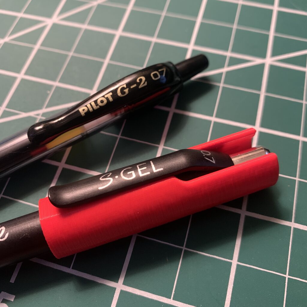 3D Printed Pocket Pen Cover. I was tired of marking my pants with my gel pens. Used red PLA filament. 